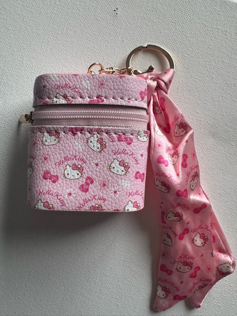 Hello Kitty Pink Printed Mini Pouch Keychain with Scarf ear pod holder.